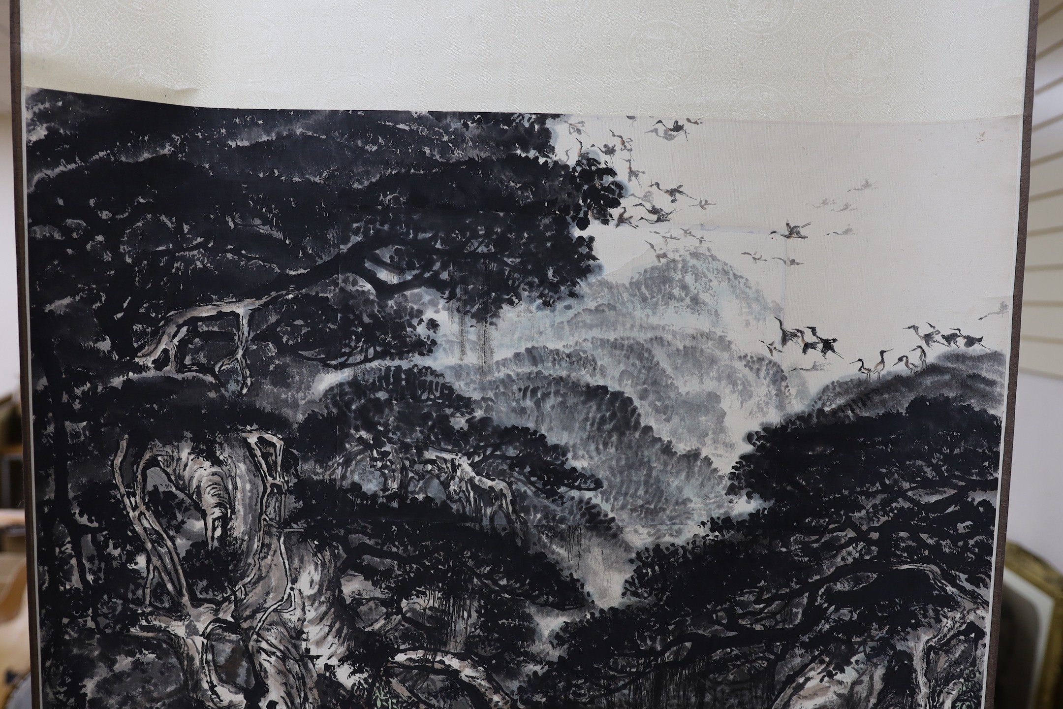 A Chinese landscape scroll painting and a Japanese scroll